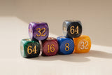 Marbleized backgammon doubling cube and four matching dice with engraved numerals