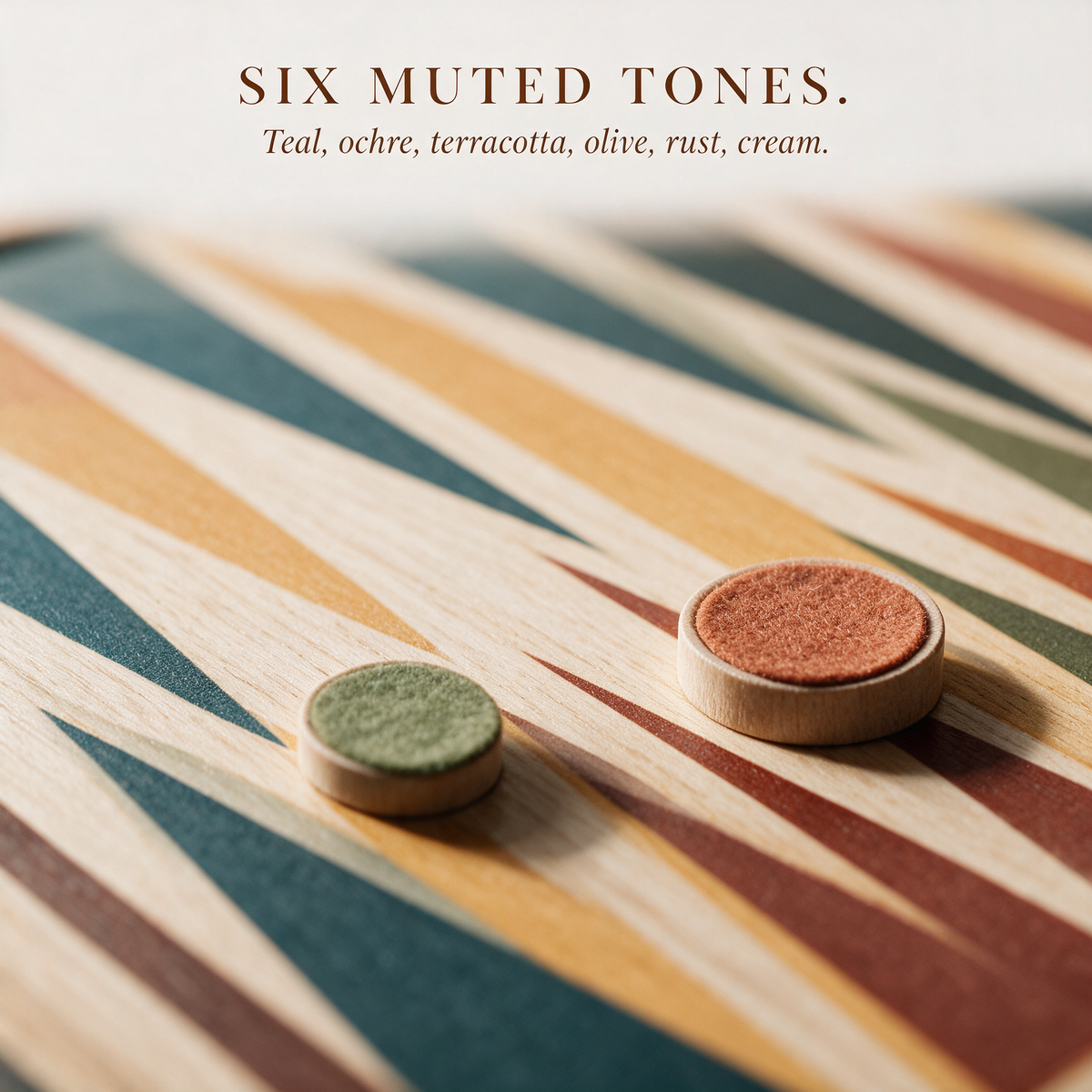 Close-up of the points in teal, ochre, terracotta, olive, rust and cream