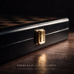 The brass-tone catch clasped shut on the black lacquered case edge
